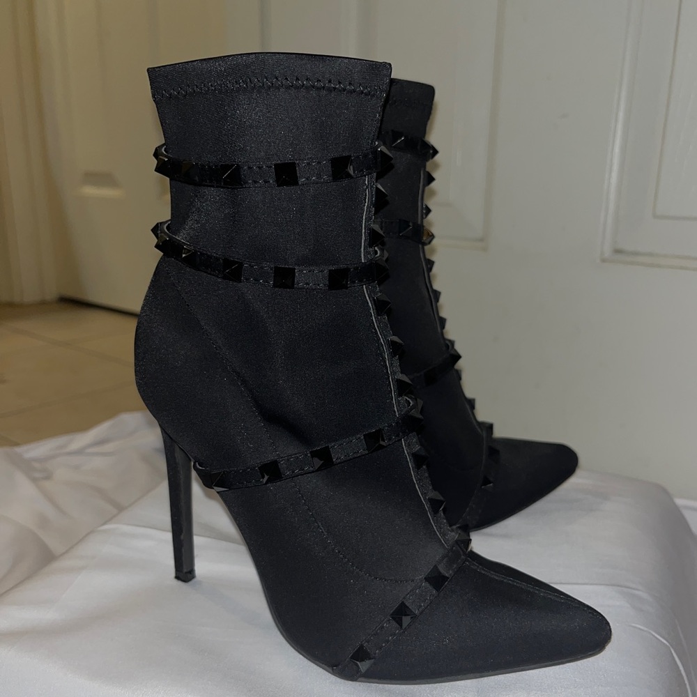 Black spiked stiletto heels